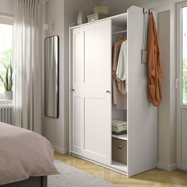 HAUGA Wardrobe with sliding doors, white, 118x55x199 cm