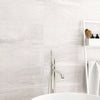 Soft travertin Ivory Matt Patterned Stone effect Porcelain Wall & floor Tile, Pack of 7, (L)600mm (W)300mm
